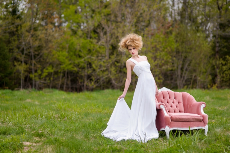 Bride in field with chair