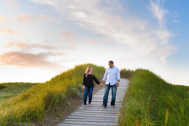 Couple on beach walkway Cap Pele