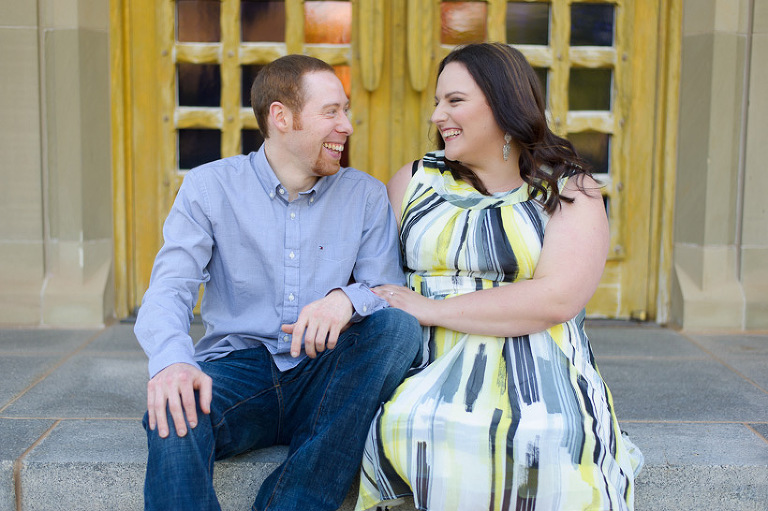 Couple sitting and laughing