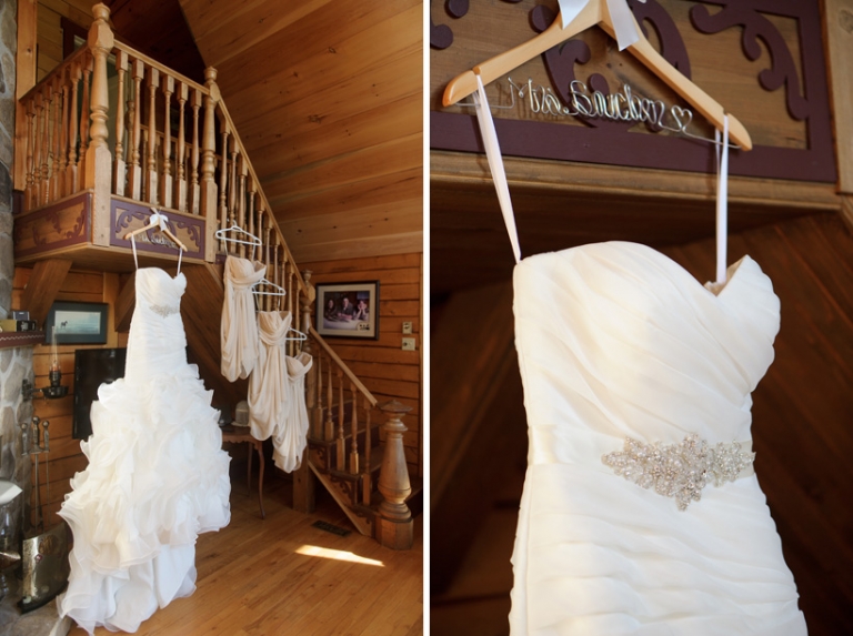 wedding dress hanging in stairs