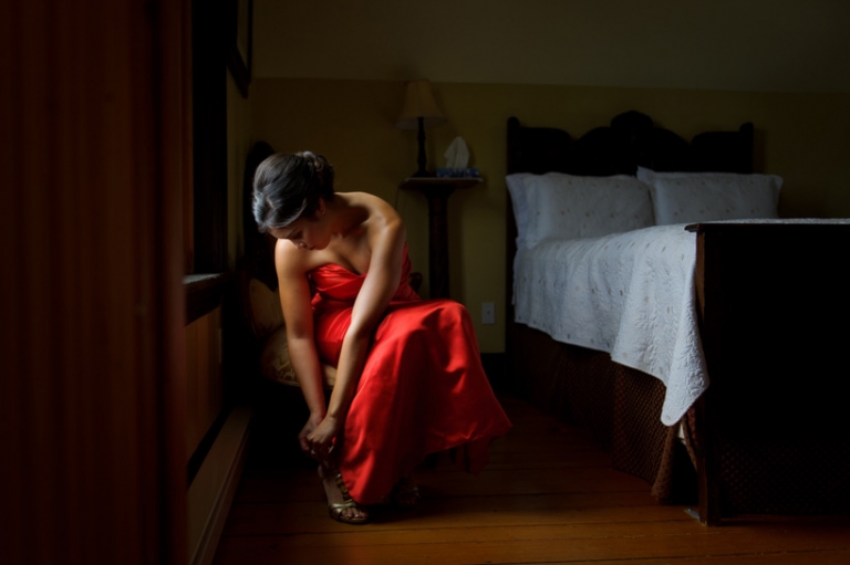 Bride putting on shoes