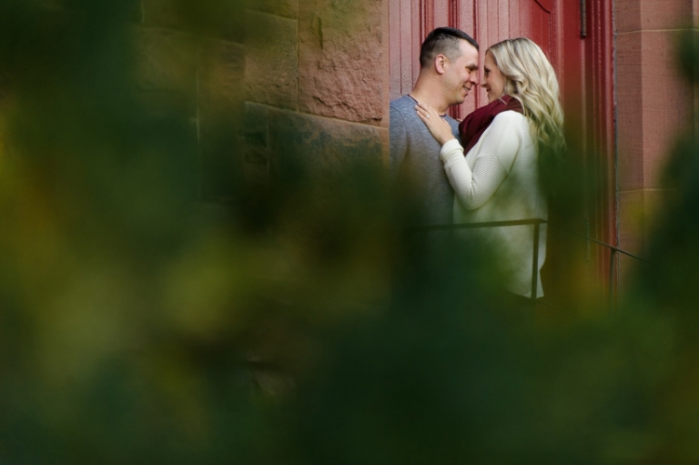 couple behind trees in Moncton