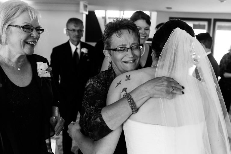 Post-ceremony hugs from mother of the groom