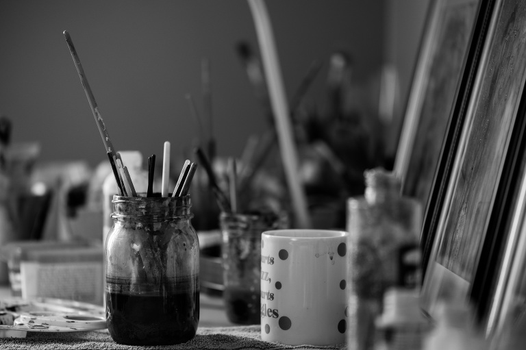 Paint brushes in mason jar