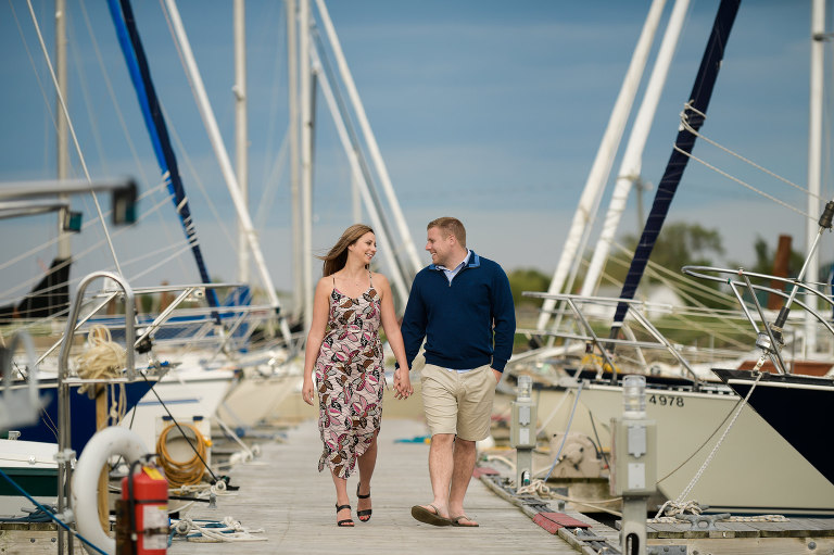 Couple walking on docks - Pointe Du Chene