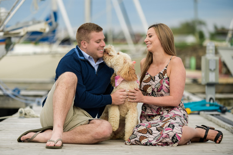 Couple with dog at marina