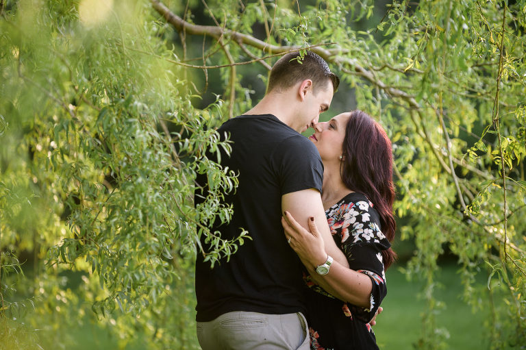 Couple under willow trees