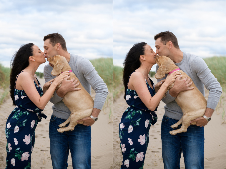Dog kisses couple