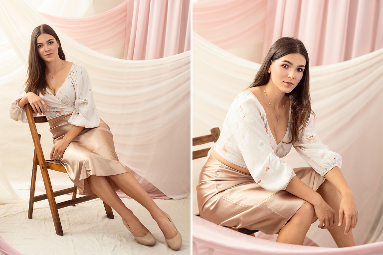 Female model surrounded by pink fabric